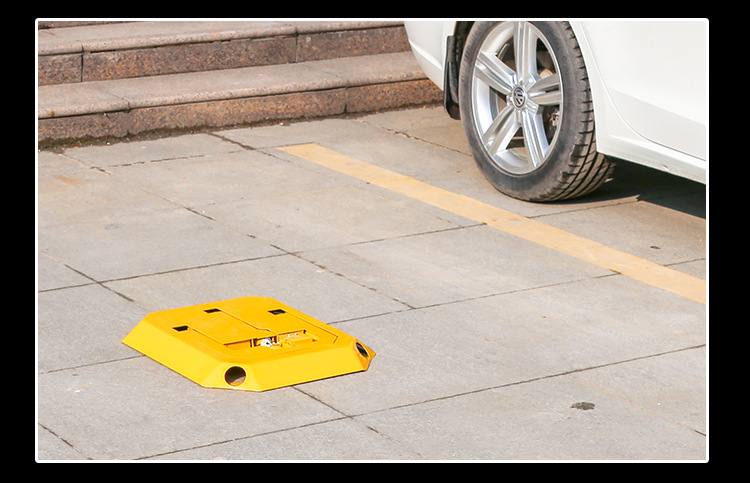 Thick cast iron hinge detail for VIP parking slot security lock in Singapore